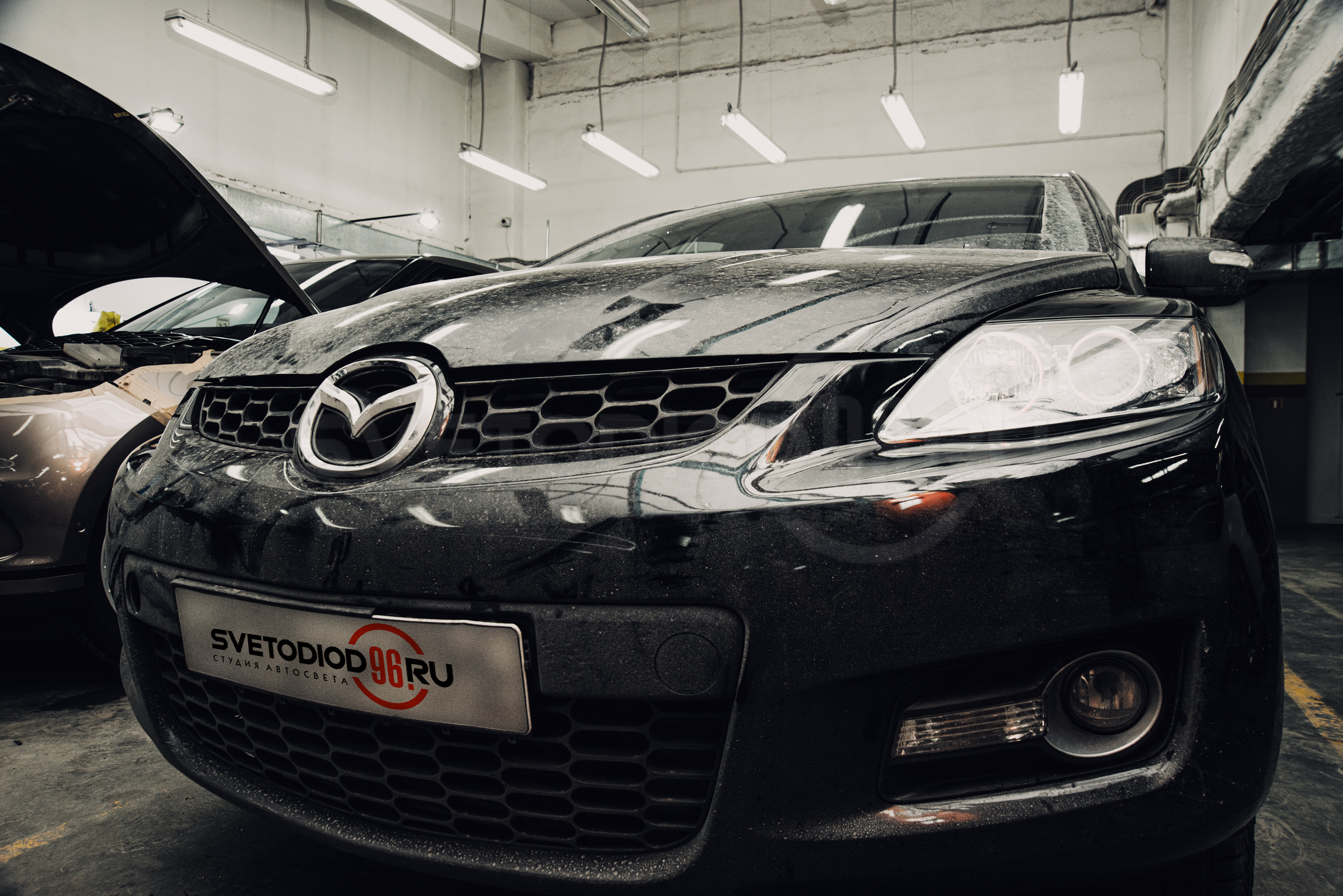 Замена ксеноновых линз на Mazda CX-7